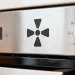 What is the triangle symbol on the oven